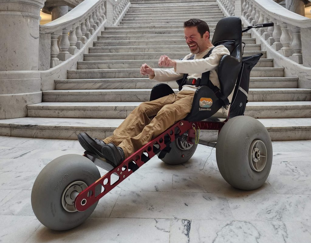 Sam Durst in Medium Extreme Motus all-terrain wheelchair