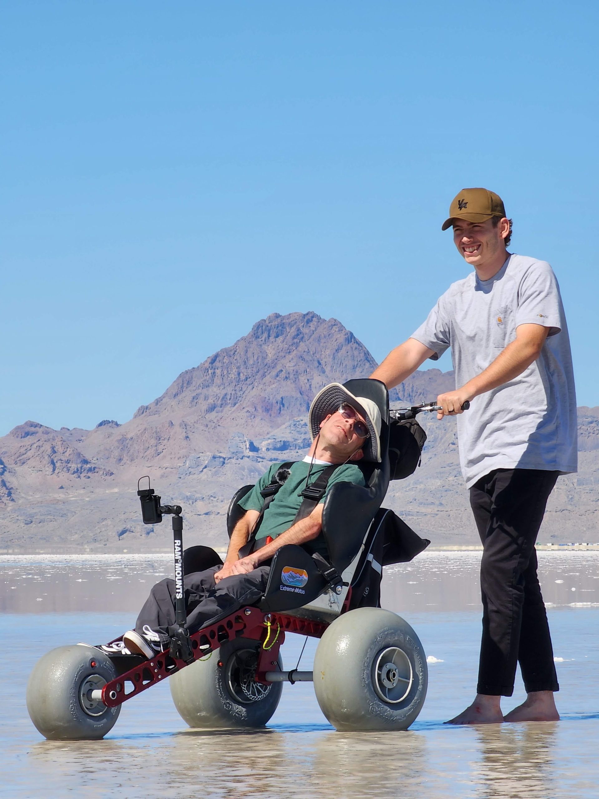 Man with cerebral palsy at the Bonneville Salt Flats in an Extreme Motus All-Terrain Wheelchair. 