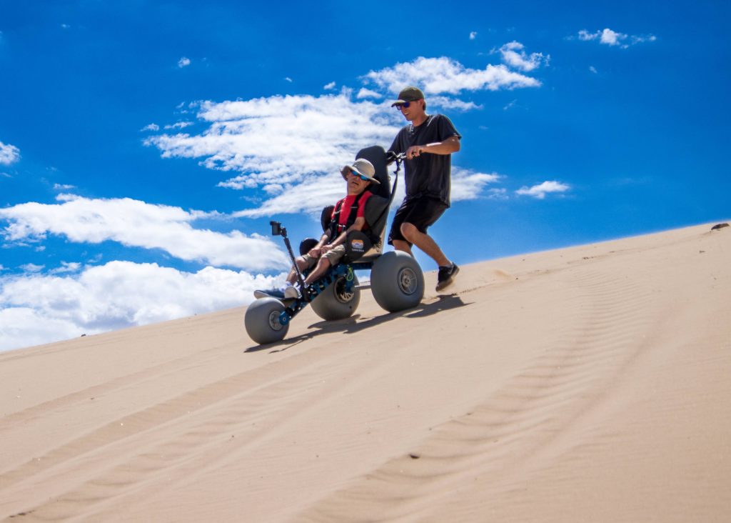 Extreme motus all terrain wheelchair at Little Sahara Sand Dunes, UT. 