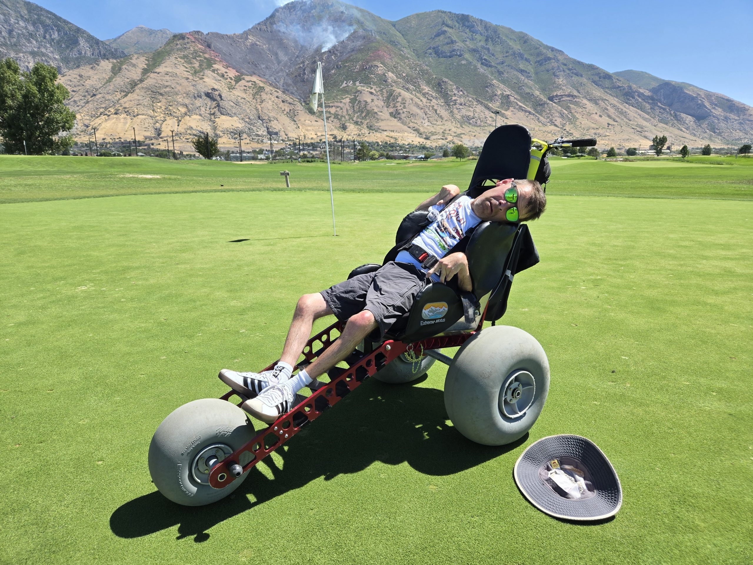 all terrain wheelchair on a golf course