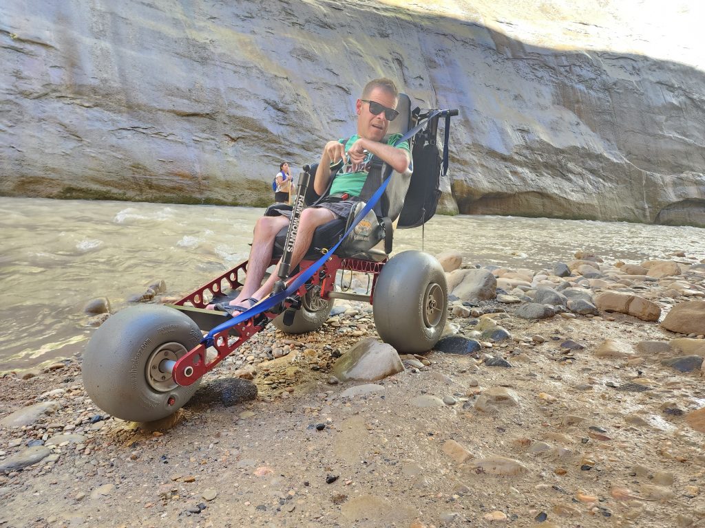 The Extreme Motus wheelchair at the edge of the Virgin River in Zion National Park