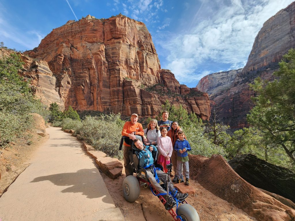 Group photo with the Extreme Motus wheelchair near Angels Landing in Zion National Park